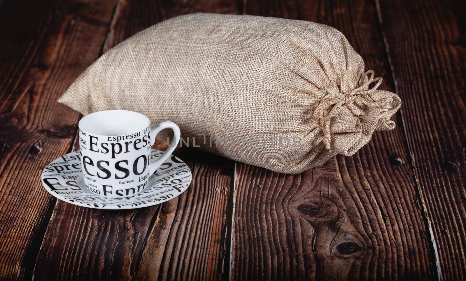 Cup of coffee and jute bag  by CaptureLight