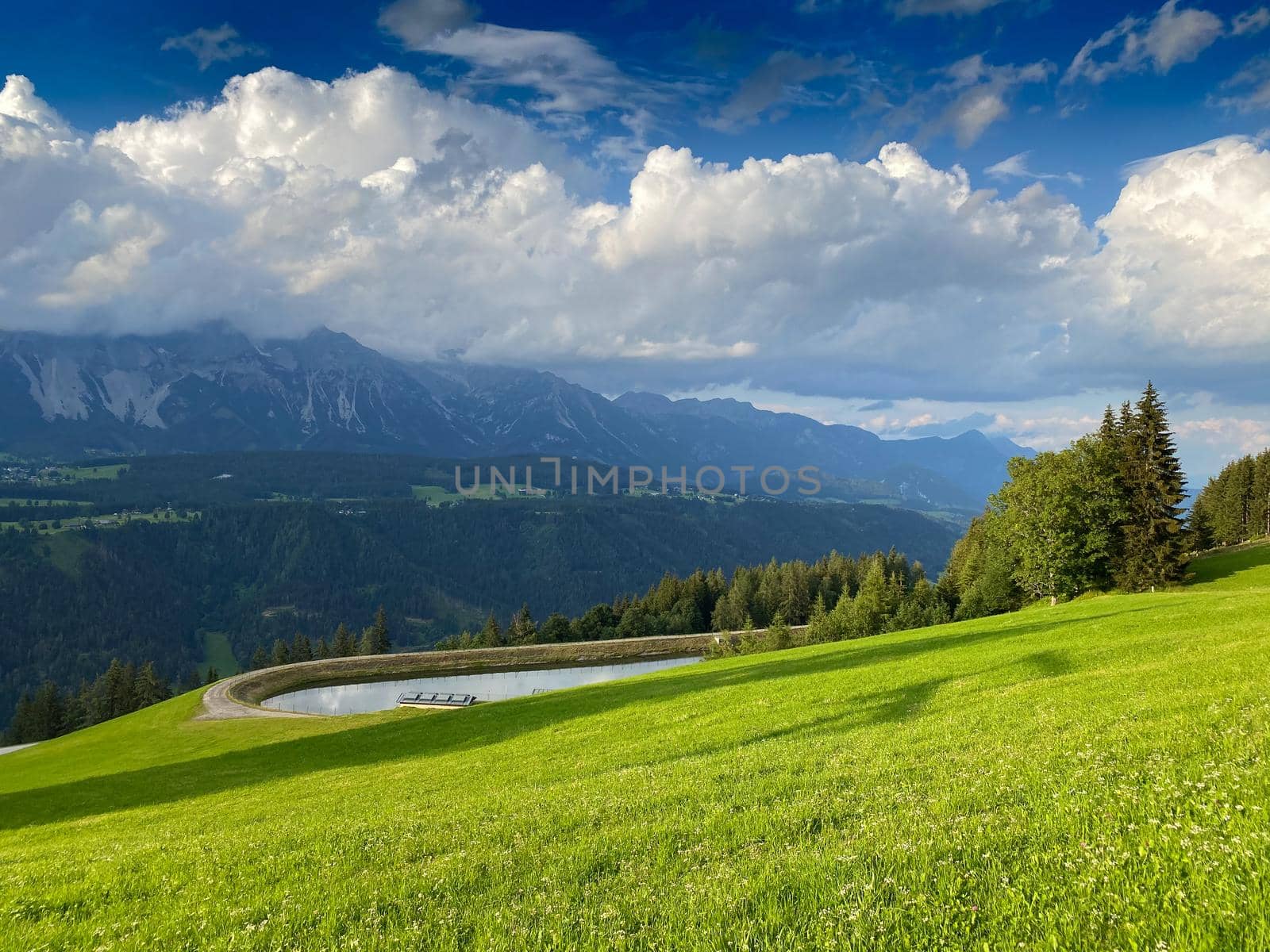 Dachstein mountain and summer valley views from Rohrmoos-Untertal, Austria. Rohrmoos-Untertal is a rural district known as a winter sports resort.