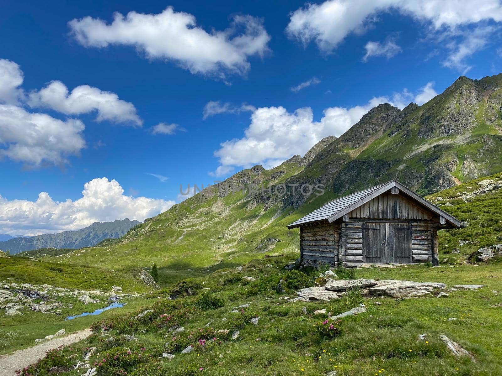 Old barn on the shore of the Lake Giglachsee, Austria.  by CaptureLight