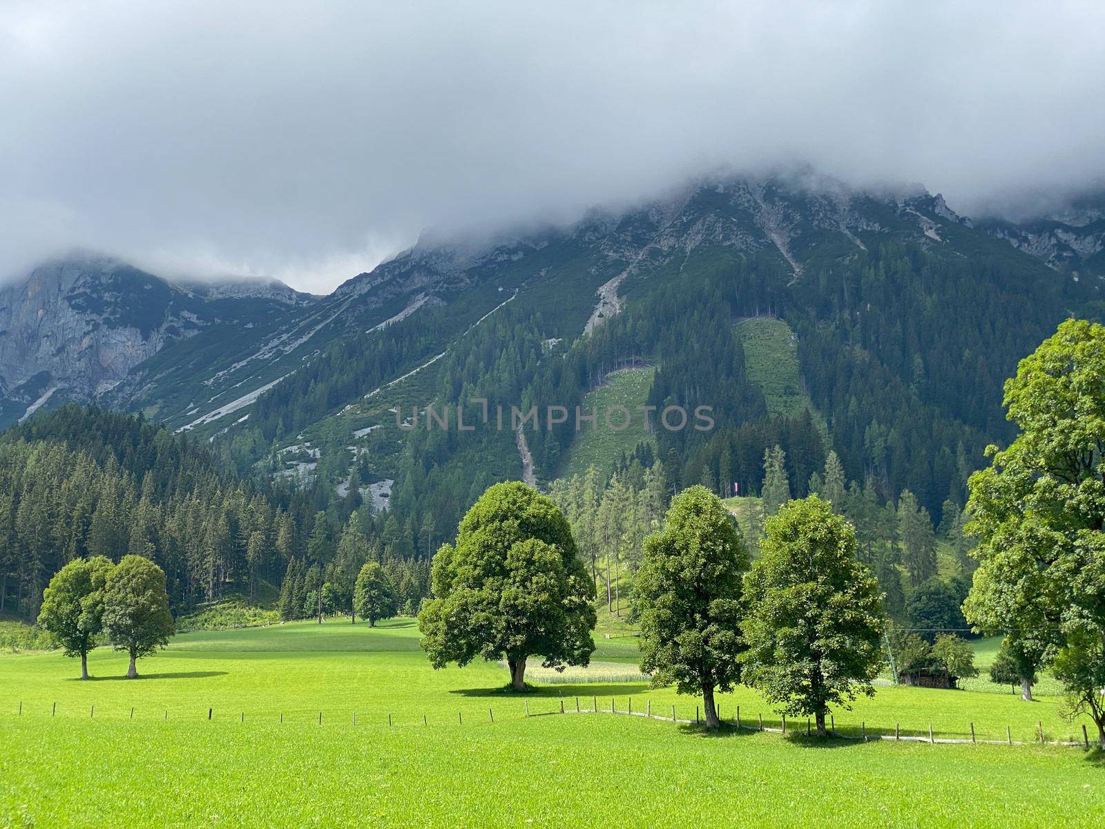 Landscape in Ramsau am Dachstein, Austria. This wonderful area of alpine pastures at the foot of the imposing south wall of Dachstein offers many hiking and amazing lookout points.