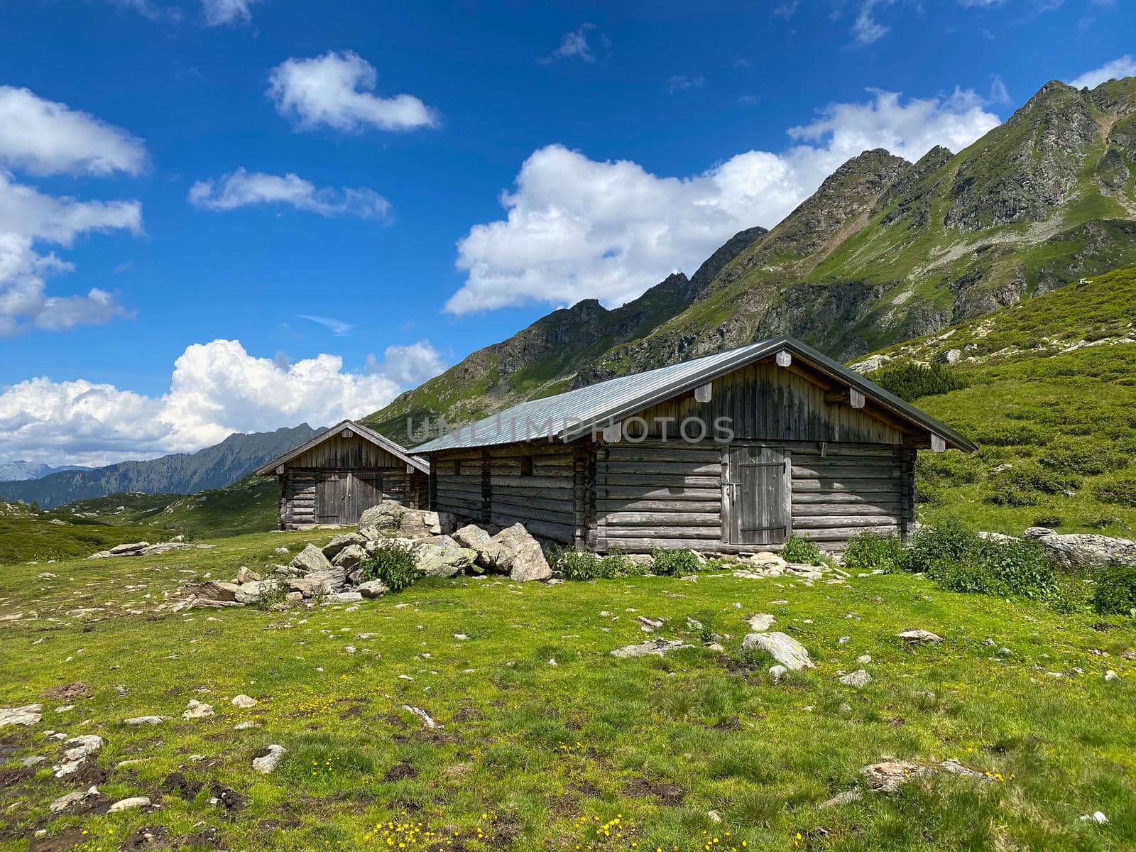 Old barns on the shore of the Lake Giglachsee, Austria.  by CaptureLight