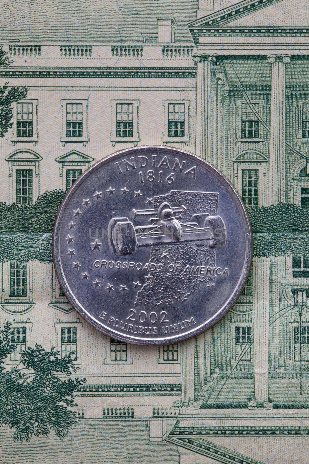 A quarter of Indiana on US dollar bills. Symmetric composition of US dollar bills and a quarter of Indiana