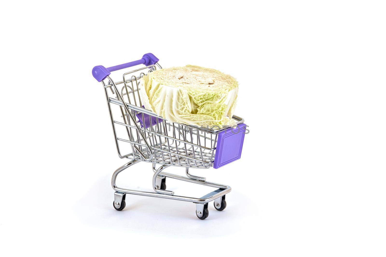 Cabbage in a supermarket trolley on a white background by vizland