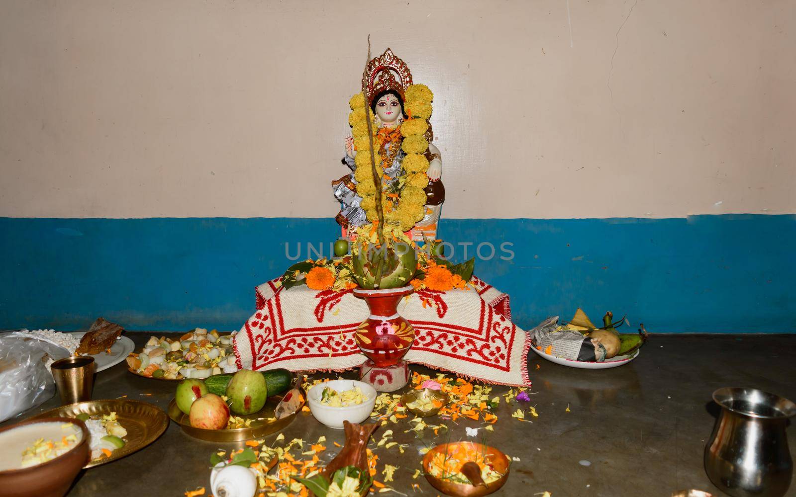 Vasant Panchami or Sarasvati Puja in honor of Saraswati, goddess of knowledge, language, music and all arts. Its is also a festival celebration for arrival of spring. Kolkata, India, 16 February 2021