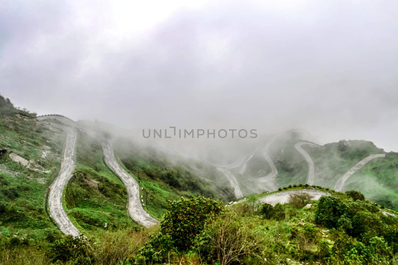 Thambi view Point, Old Silk Route, Sikkim Zuluk Loops. India on a misty foggy day. by sudiptabhowmick