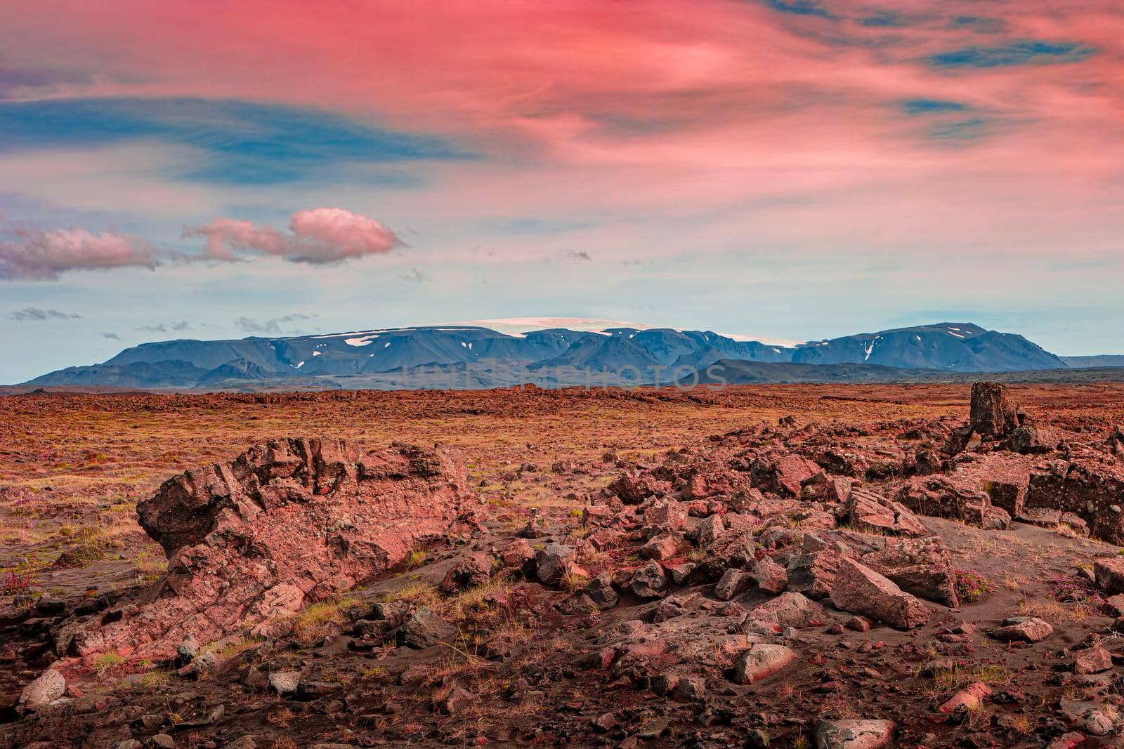 Panoramic view over volcanic reddish Martian landscape during sunset in Iceland