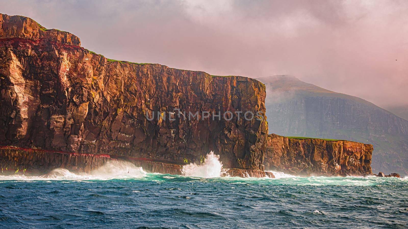 Mythical Faroe Islands in the middle of Atlantic Ocean, summer by neurobite