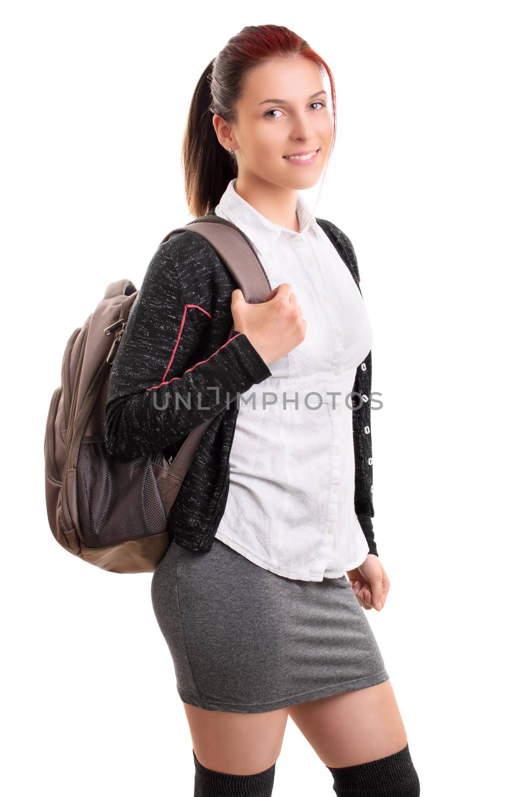 Smiling young female student with backpack by Mendelex