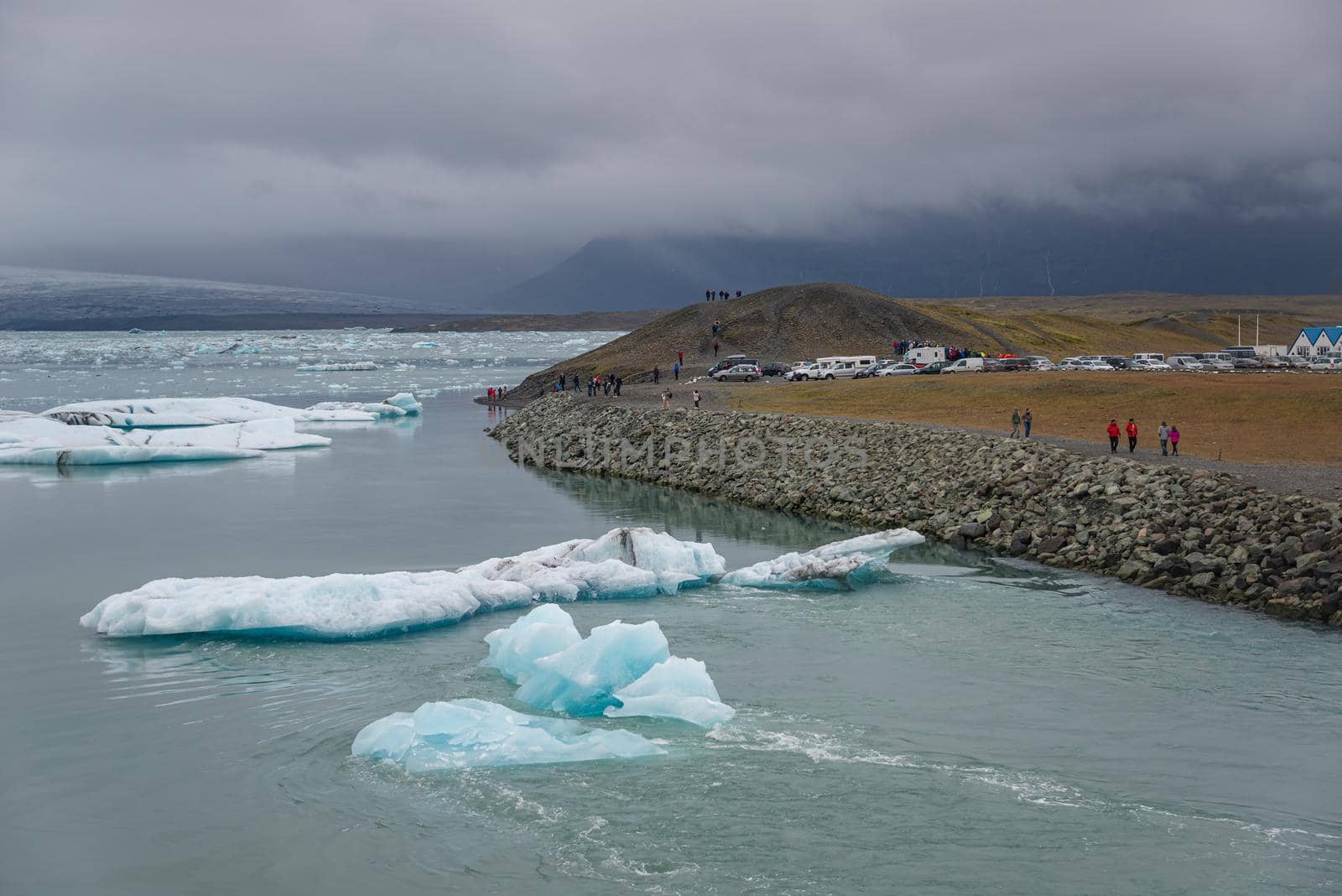 Touristic activity in Glacier Lagoon Jokulsarlon with icebergs in Iceland