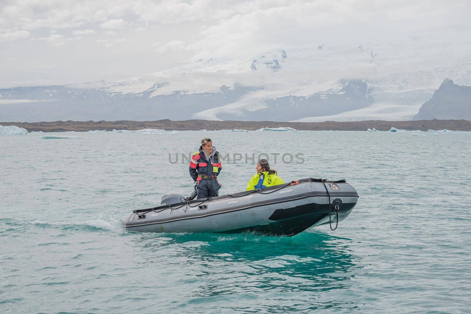 Touristic activity in Glacier Lagoon Jokulsarlon with icebergs in Iceland