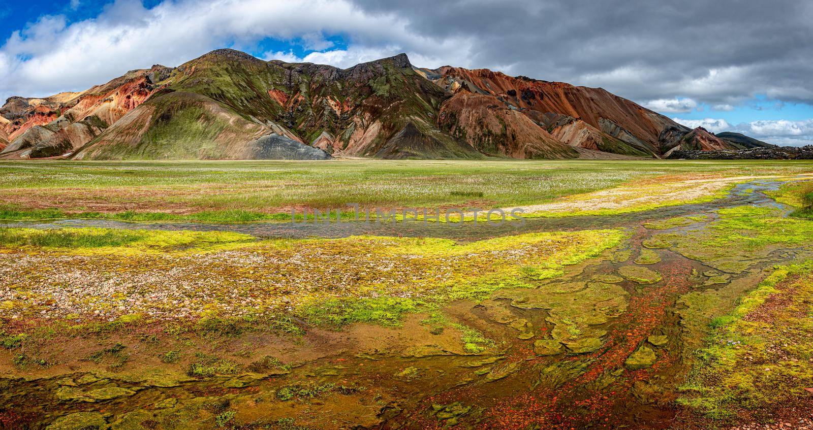 Panoramic view of colorful rhyolite volcanic mountains Landmannalaugar as pure wilderness in Iceland, summer time