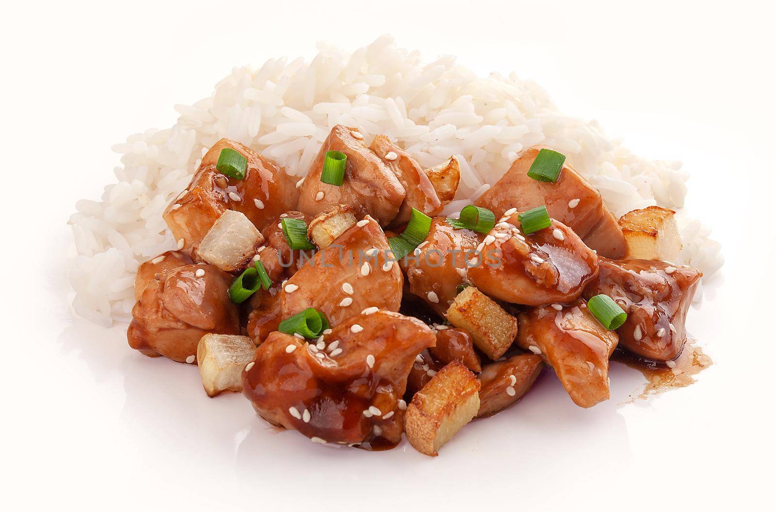 Fried chicken teriyaki with daikon, ginger, green onion and sesame on rice