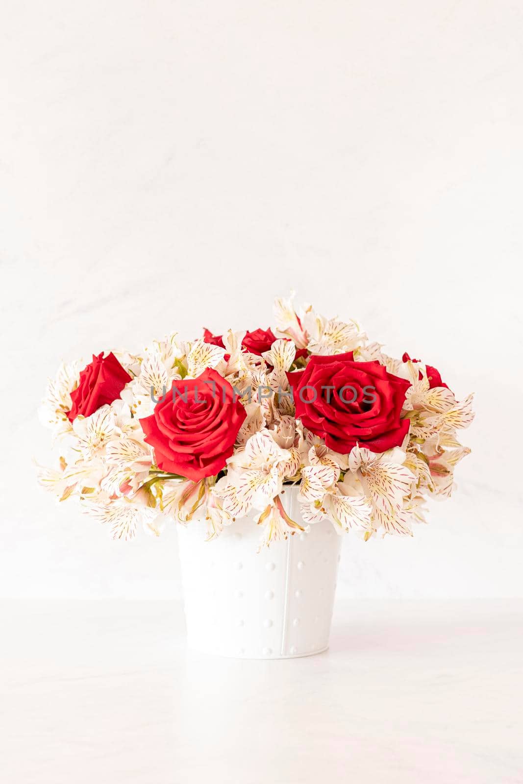 Floral arrangement composed of red roses for spring