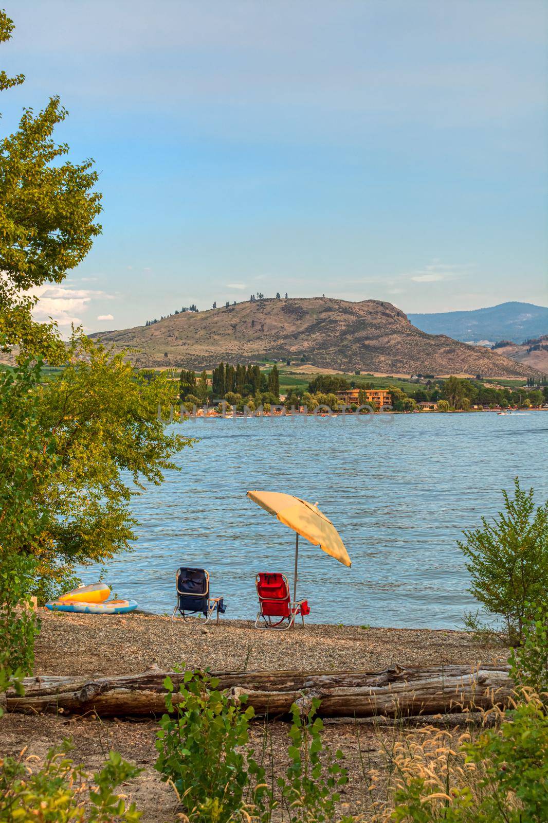 Tourist camp ground on the shore of the lake. Warm summer evening on Osoyoos lake