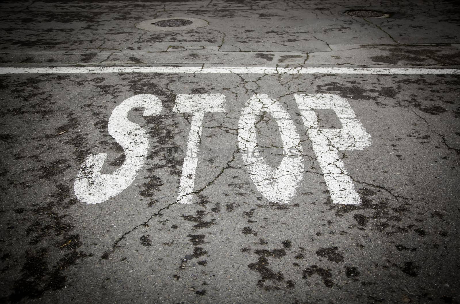 Stop sign on the asphalt by esebene