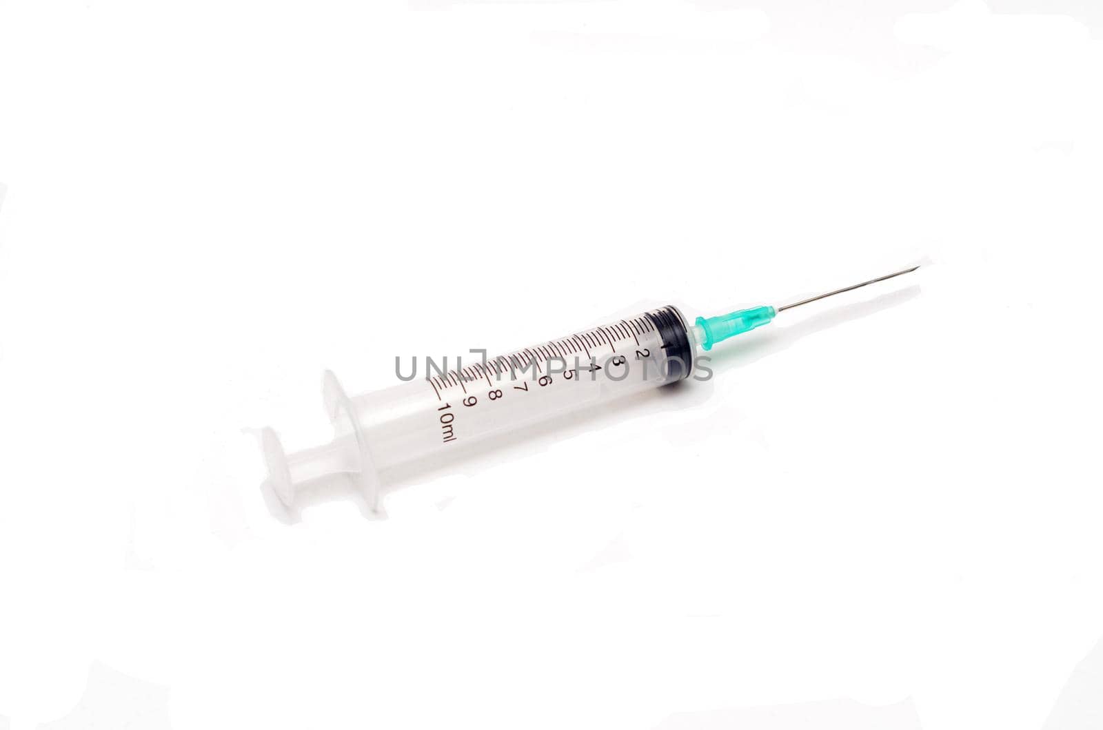 Disposable syringe isolated on white background. by andre_dechapelle