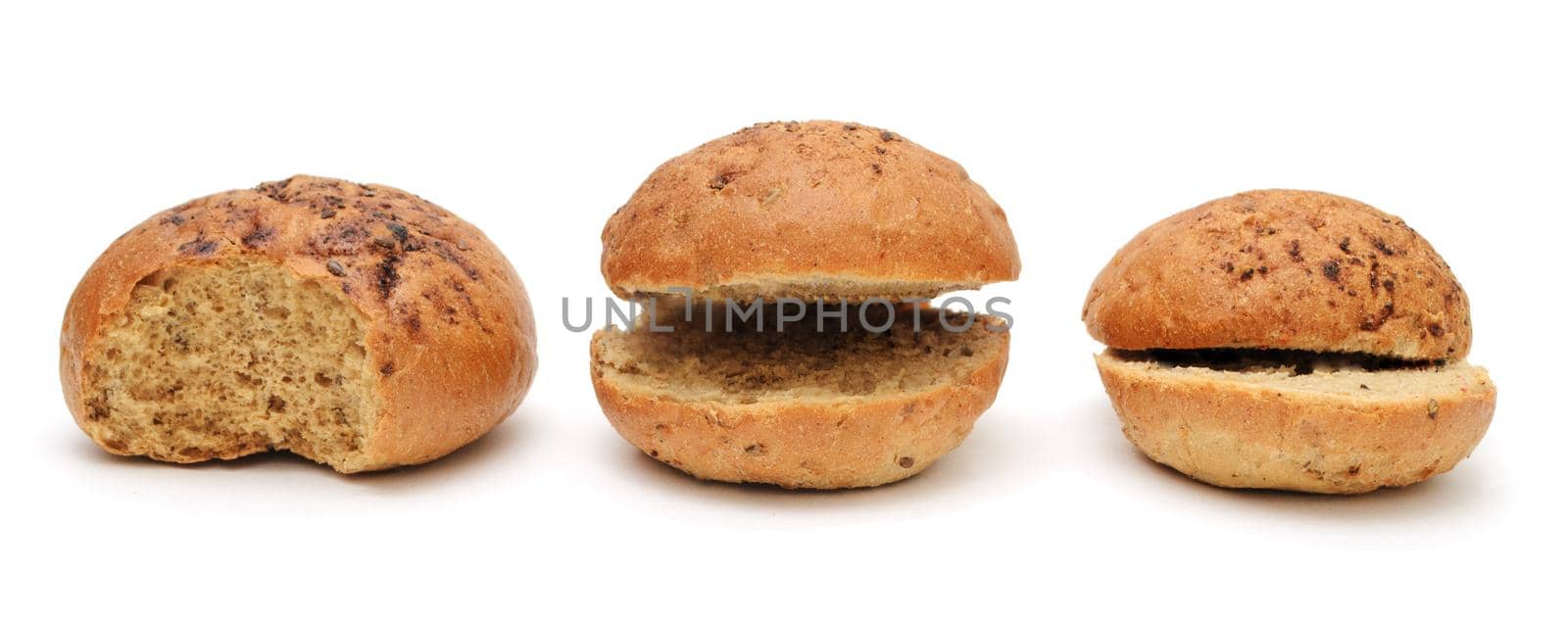 Three funny cut flax burger buns for a hamburger isolated on a white background. by andre_dechapelle