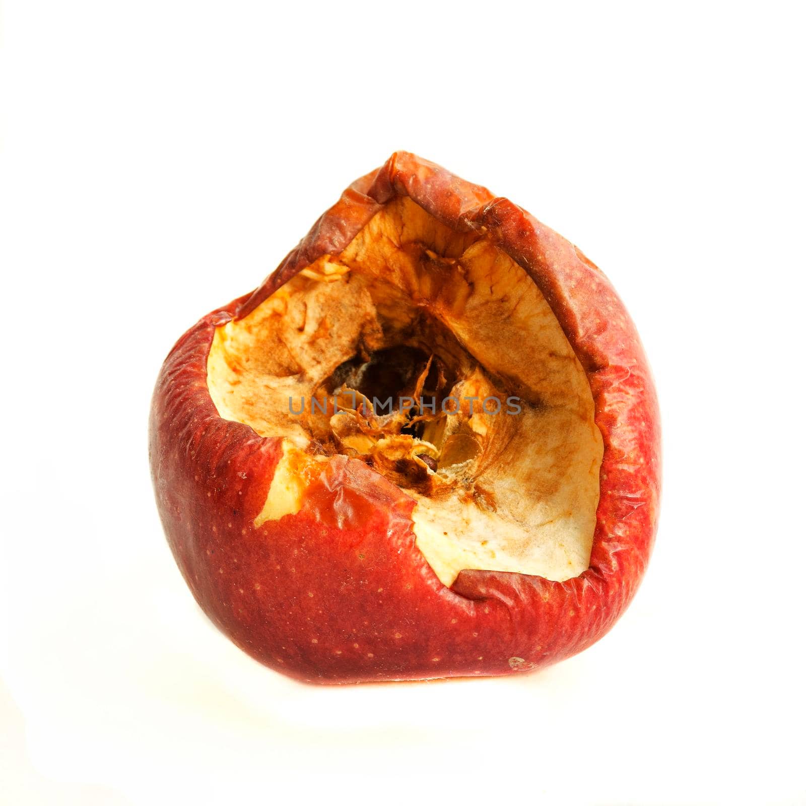  Big red bitten off and rotten apple isolated on white background. by andre_dechapelle