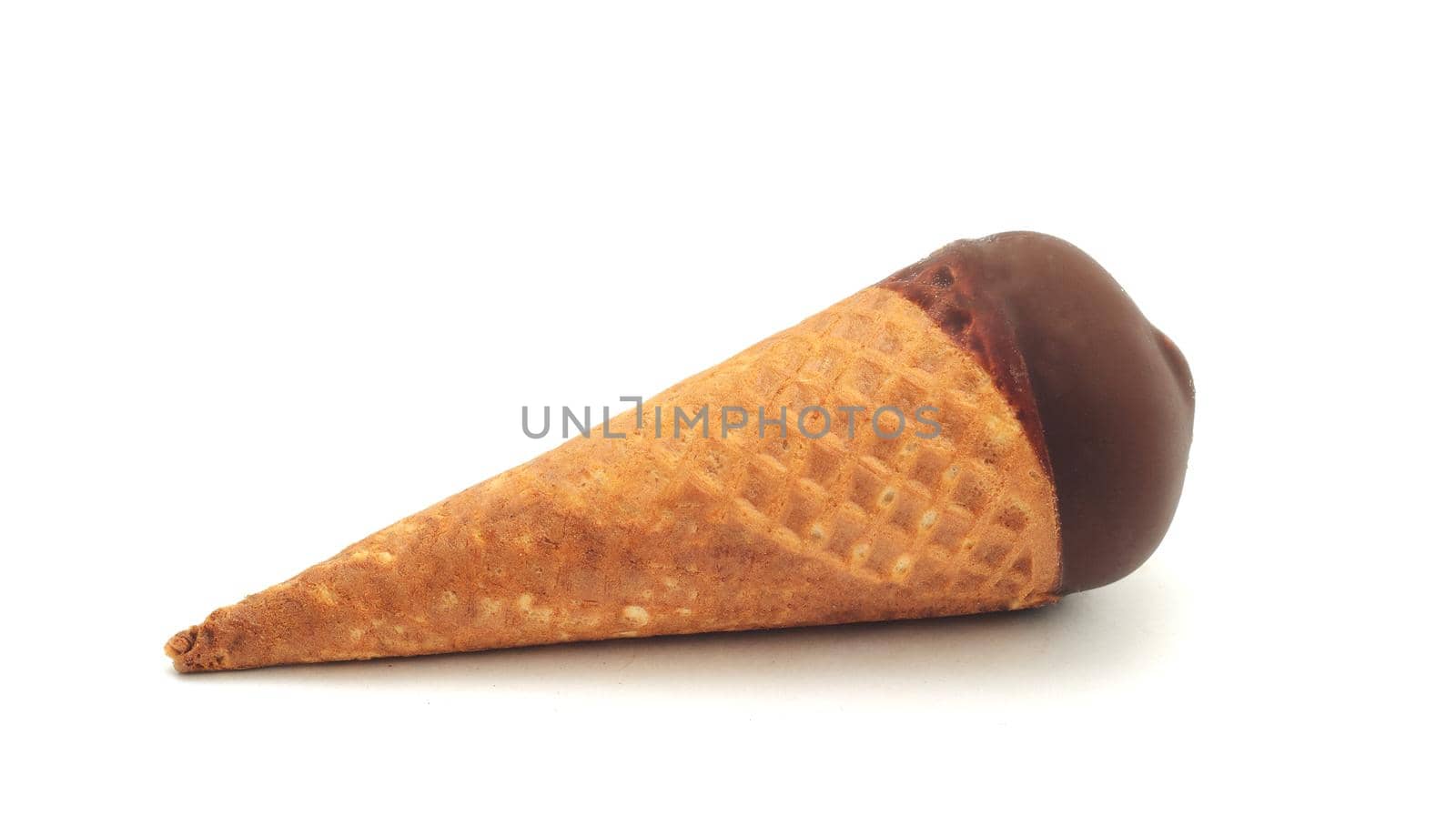 Chocolate ice-cream cone isolated on white background.Sweet summer snack. by andre_dechapelle