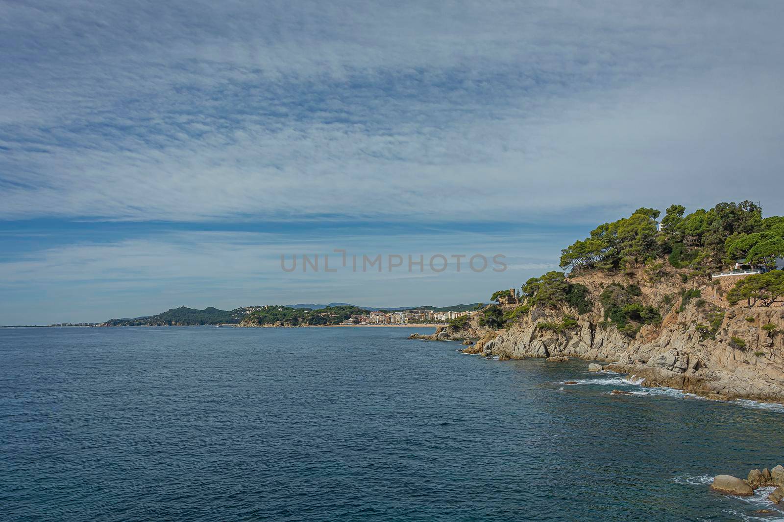 Seascape. Rocky coast in the vicinity of Lloret De Mar (Spain). Stock photo.