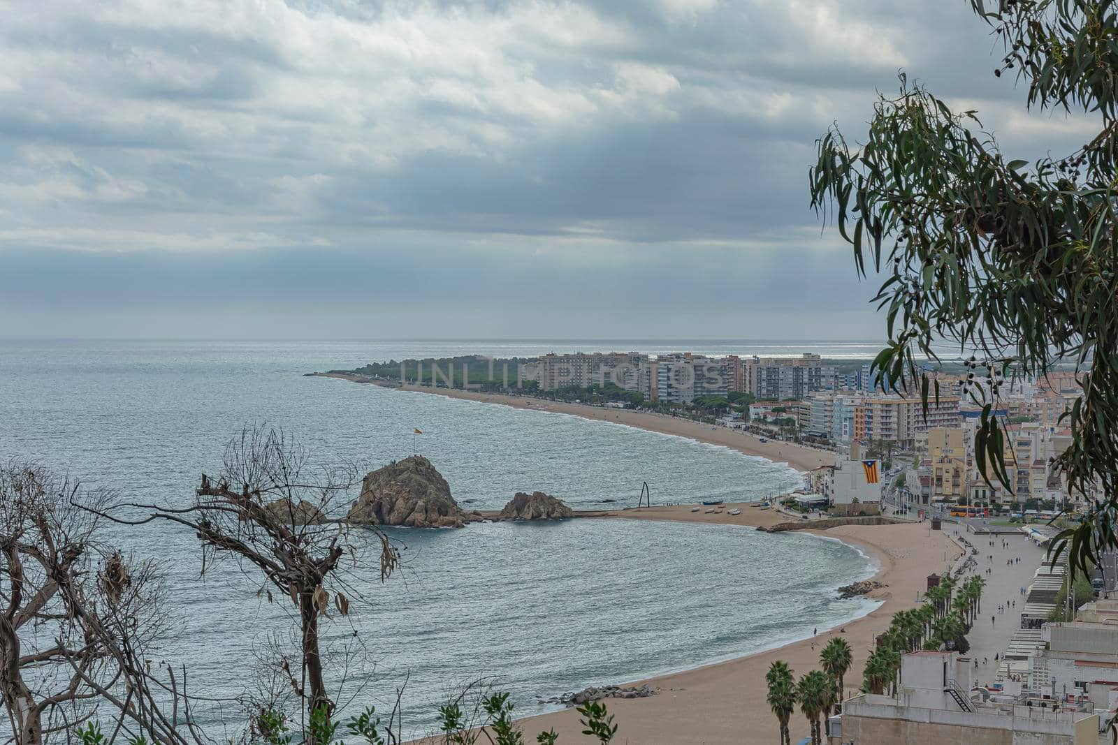 Seascape. Beach and promenade of the resort town of Blanes (Spain) by Grommik