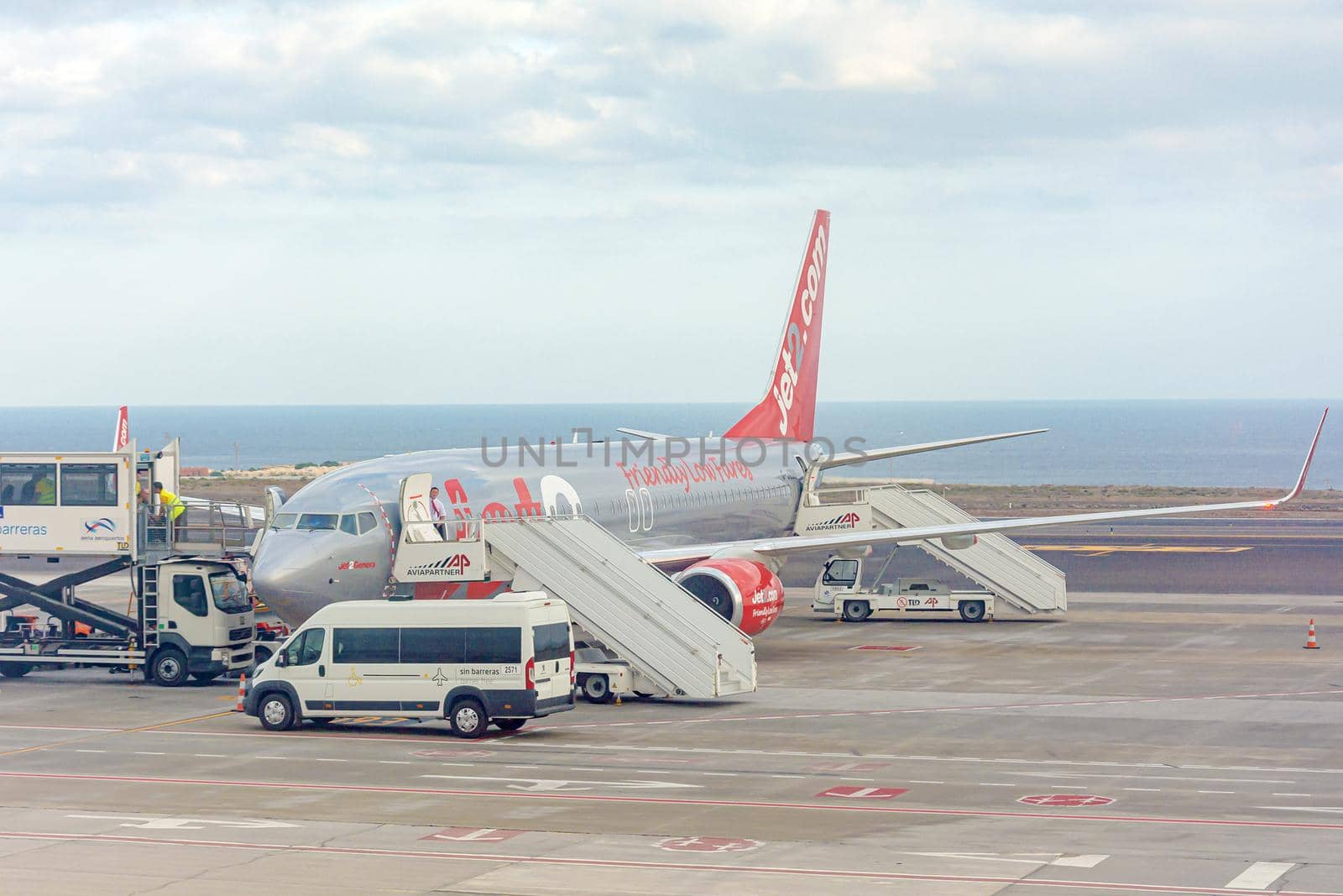 TENERIFE, SPAIN - March 21, 2021: A plane with the inscription Friendly Low Fares at the southern airport of the island of Tenerife. Stock photo.