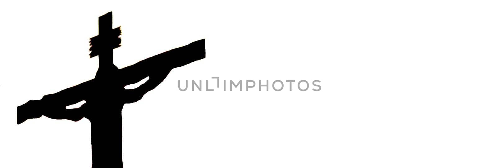 Silhouette of the crucified Jesus on a white background, copyspace and banner.