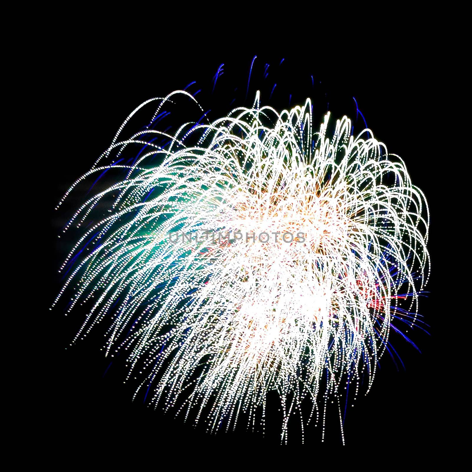 Colorful fireworks isolated on black sky background.