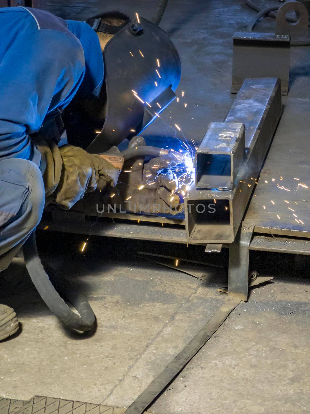 Welding Work with Equipment for Steel Metal, Iron, Sparks at Manufacturing Heavy Industry Factory, Indoor