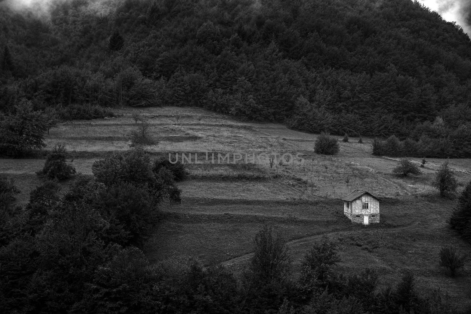 Alone old house on a hill in a mountain. Black and white by EdVal