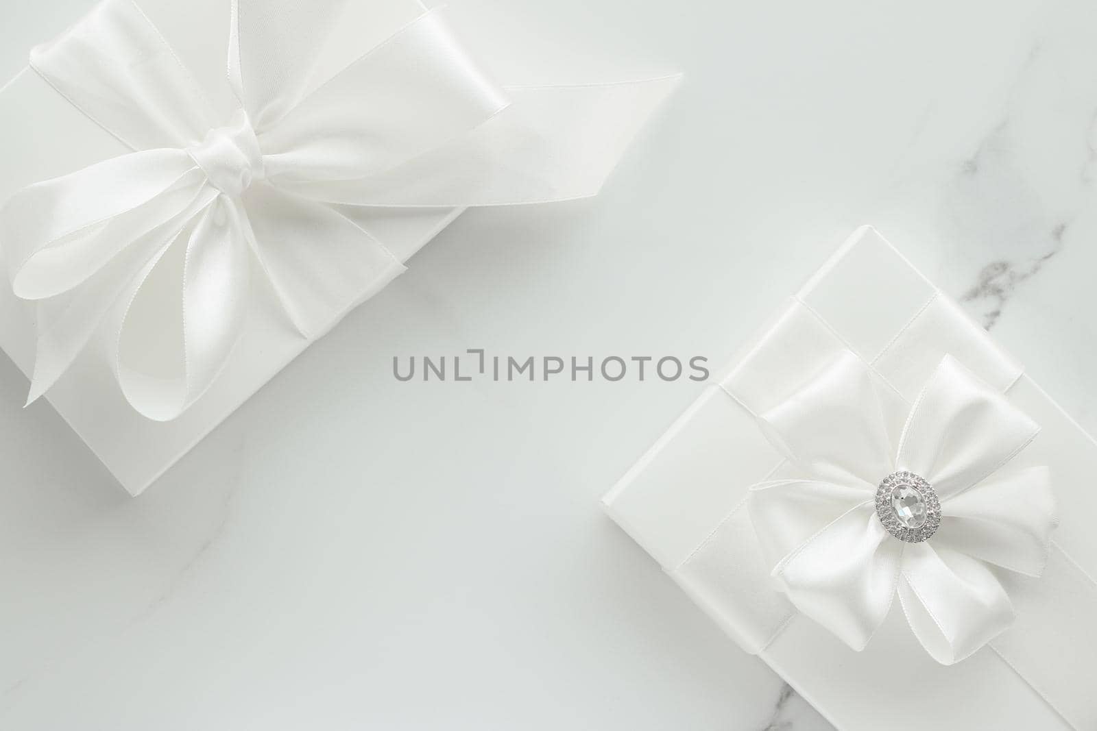 Romantic celebration, lifestyle and holiday present concept - Luxury wedding gifts on marble