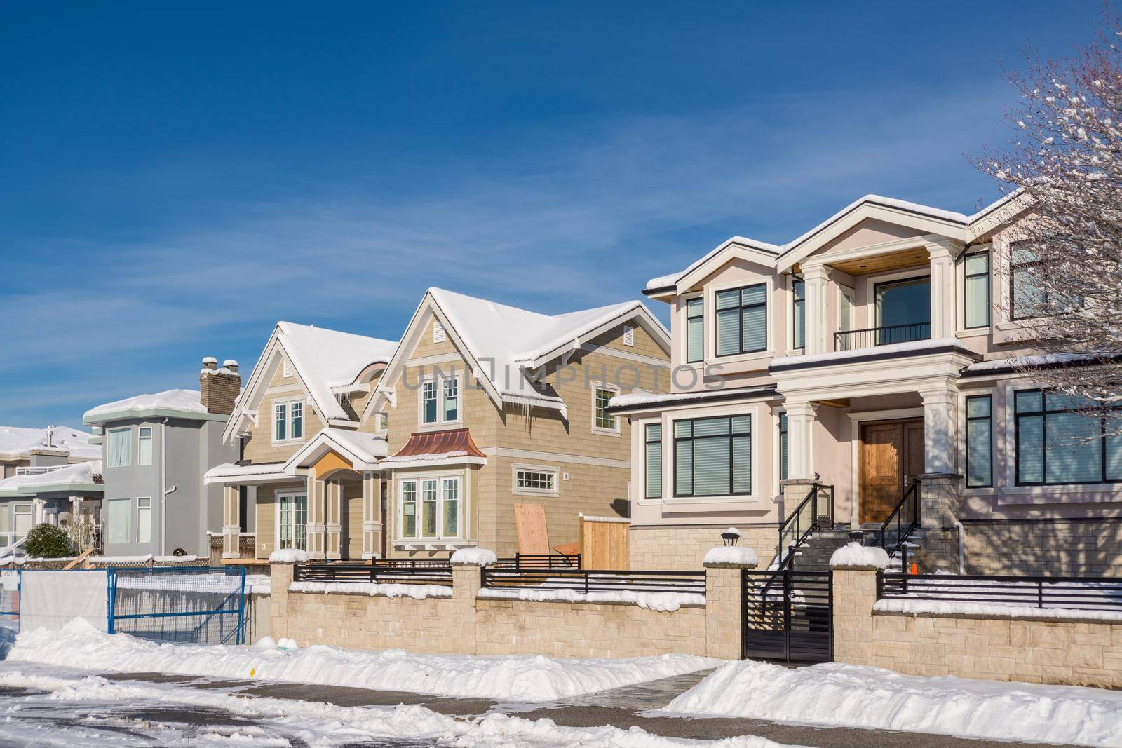 Brand new luxury houses on sunny winter day in British Columbia