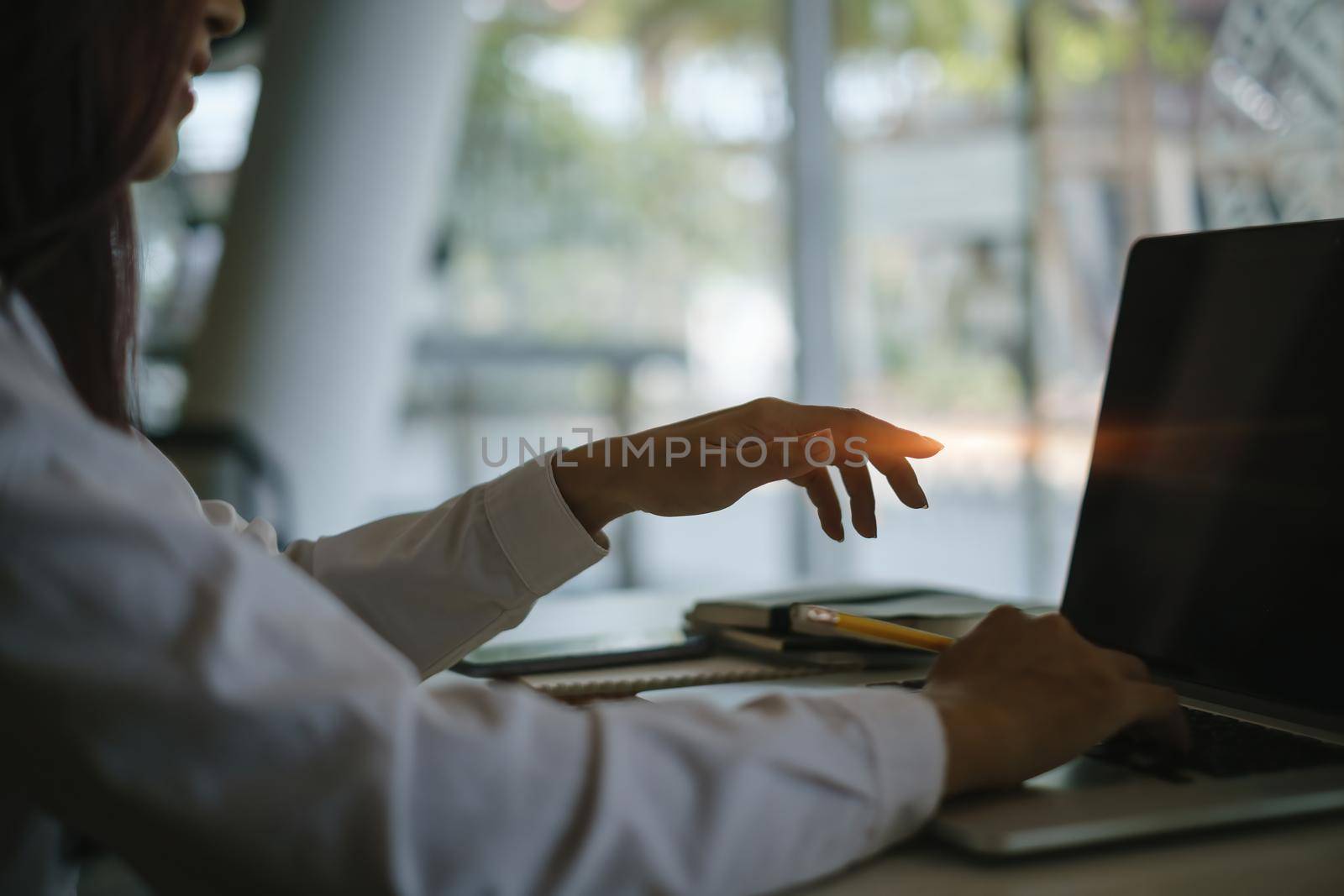 Business woman try to explain about his work to business team by video call at home office. Doctors are advising patients by video call at the hospital office. soft focus