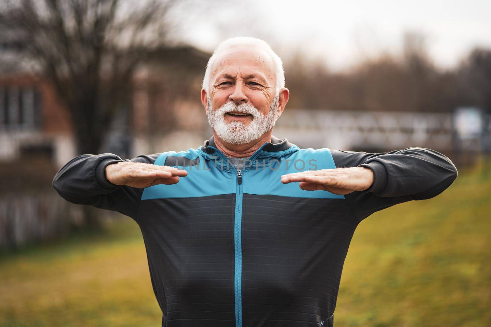 Active senior man is exercising. Healthy retirement lifestyle.