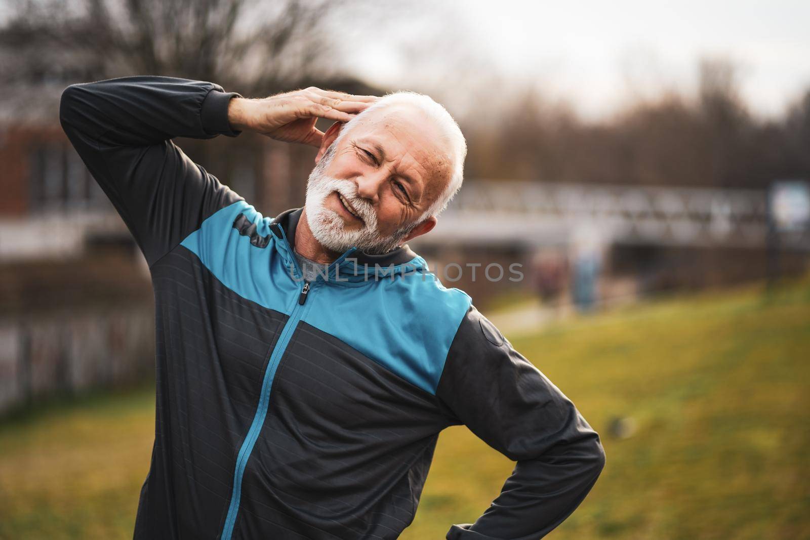 Active senior man is exercising. Healthy retirement lifestyle.