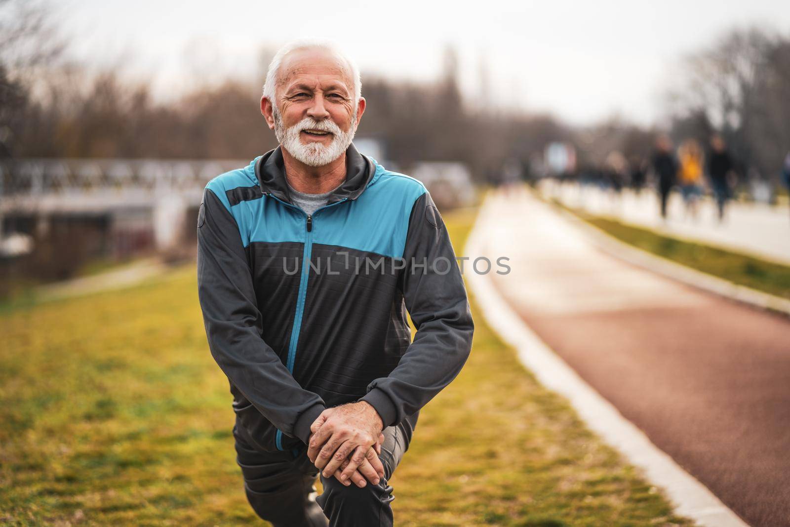 Active senior man is exercising. Healthy retirement lifestyle.