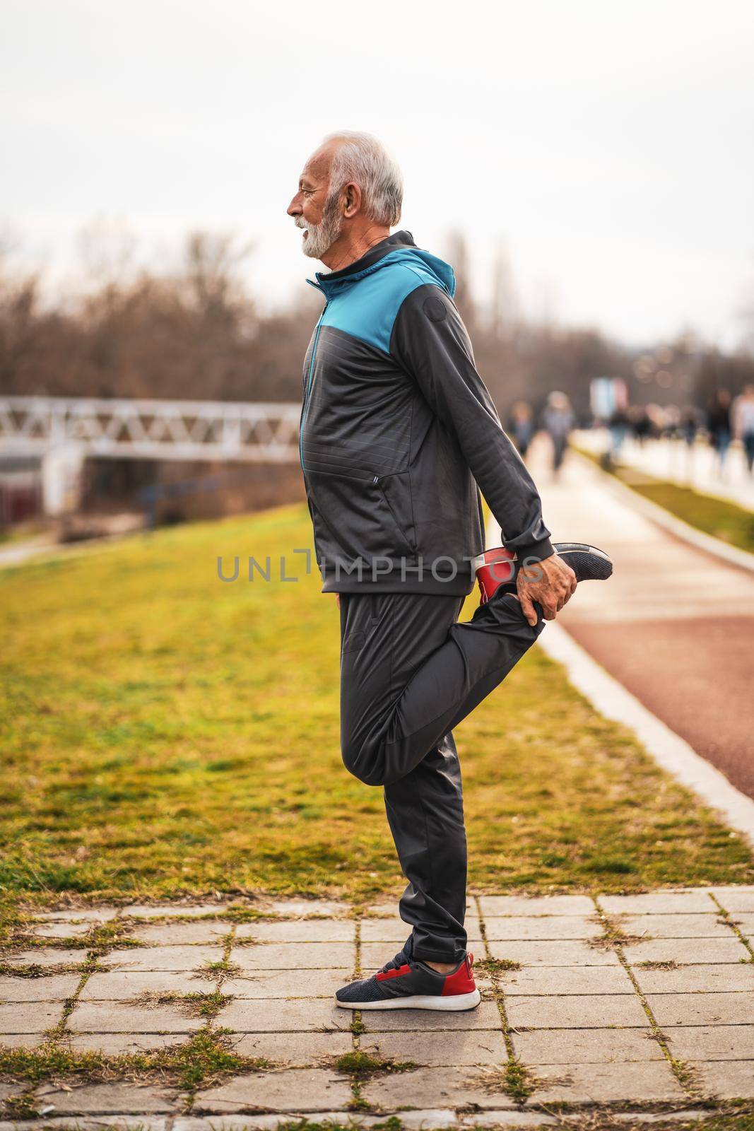 Active senior man is exercising. Healthy retirement lifestyle.