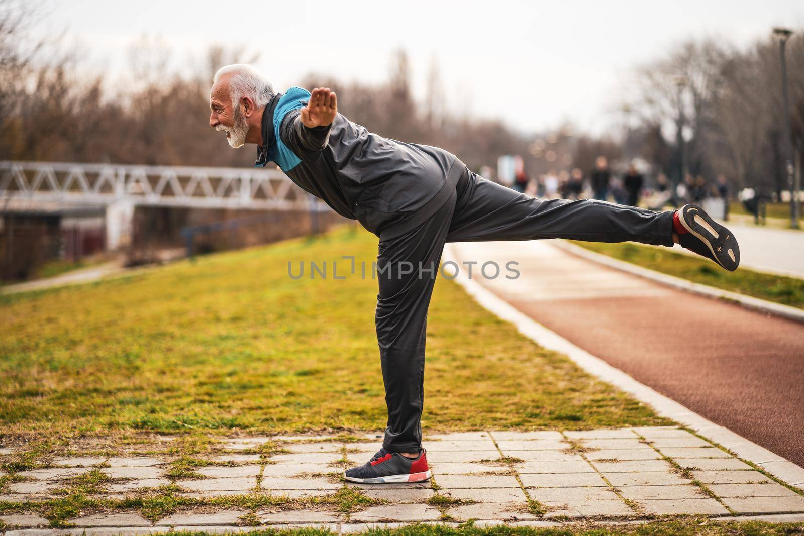 Active senior man is exercising. Healthy retirement lifestyle.