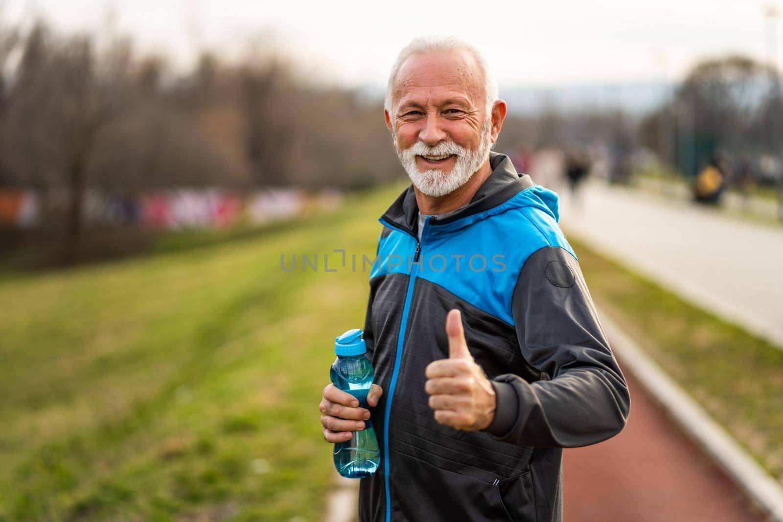 Happy senior man is ready for exercising. Healthy lifestyle.