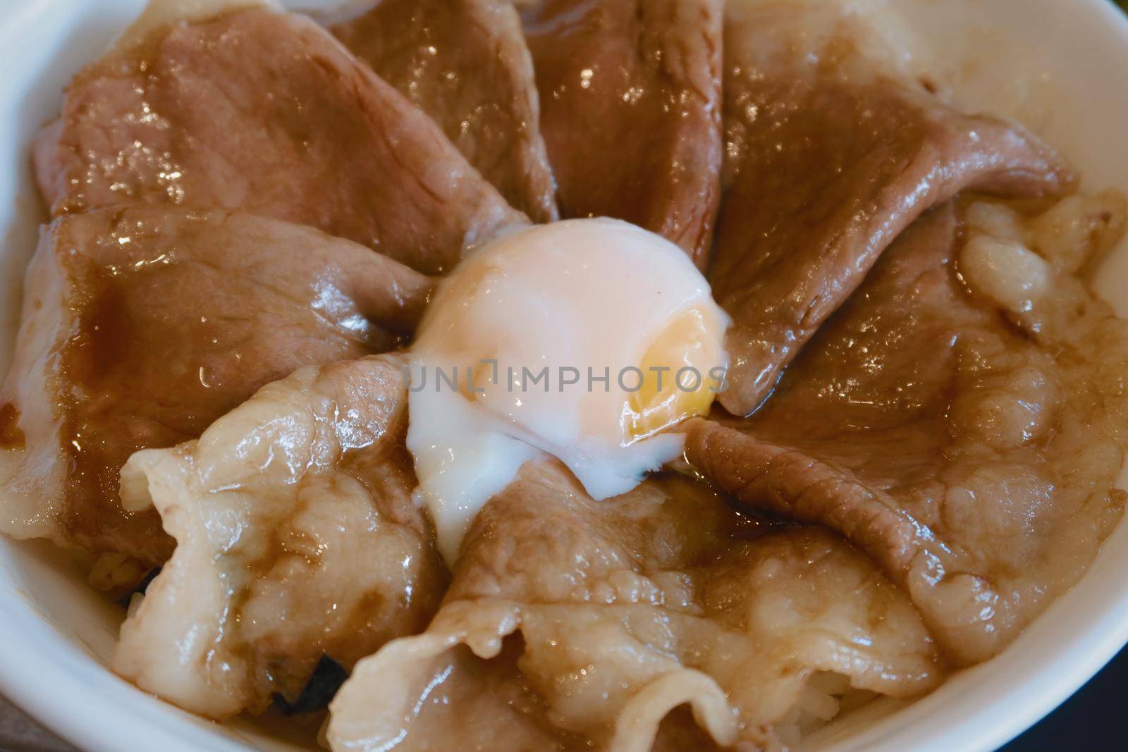 closeup wagyu beef with onsen egg