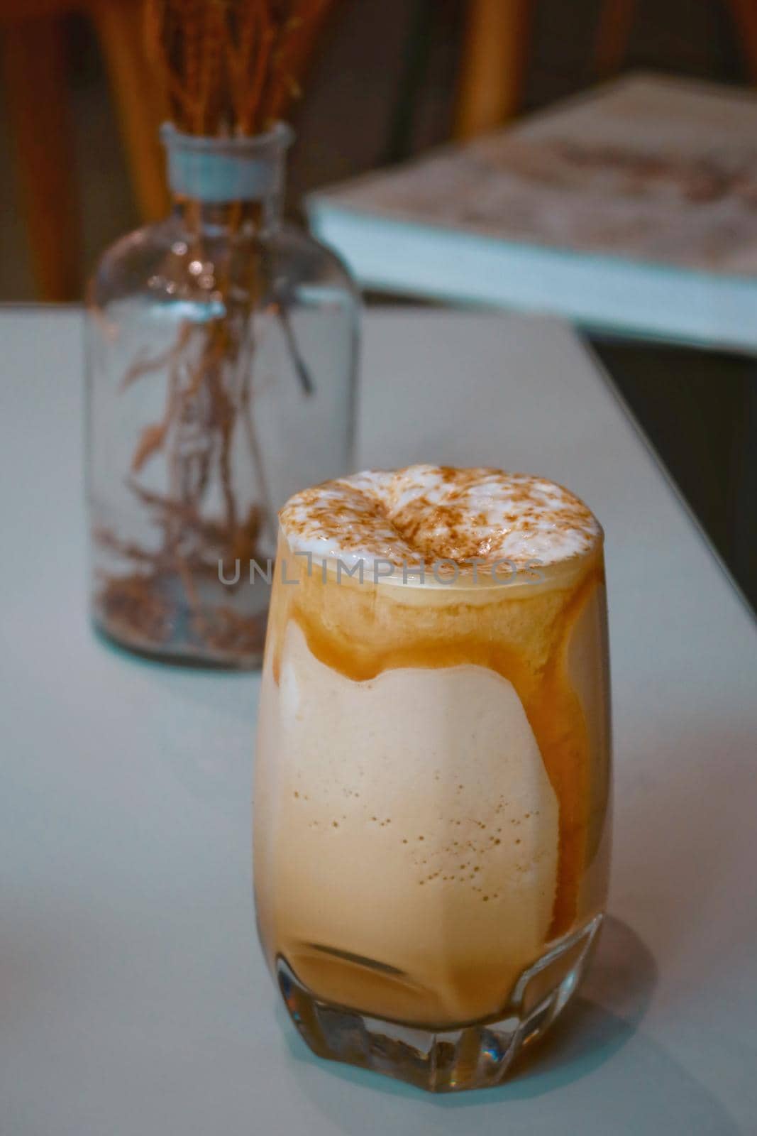 caramel cream frappe coffee in glass by baworn47