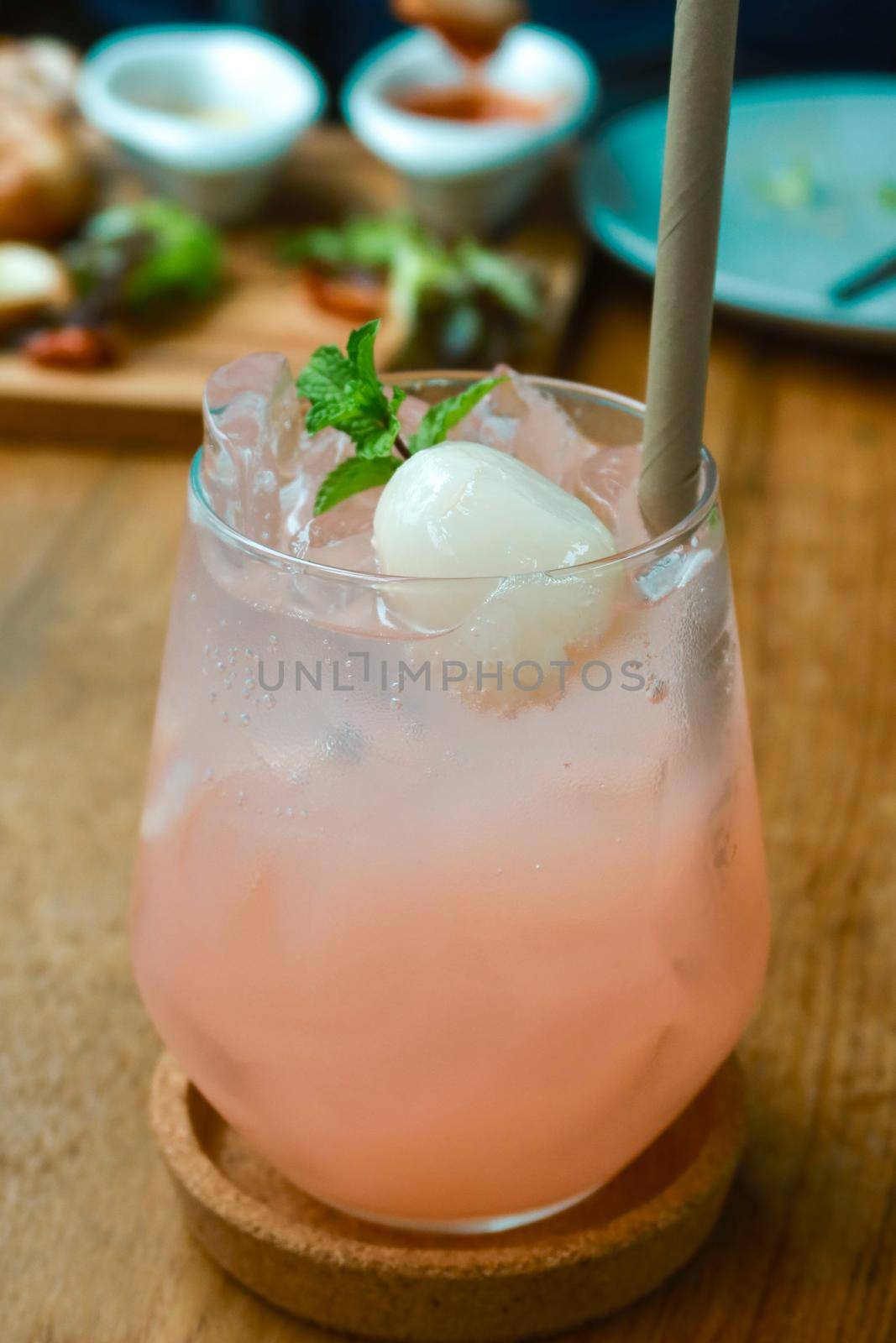 closeup lychee soda on wood table