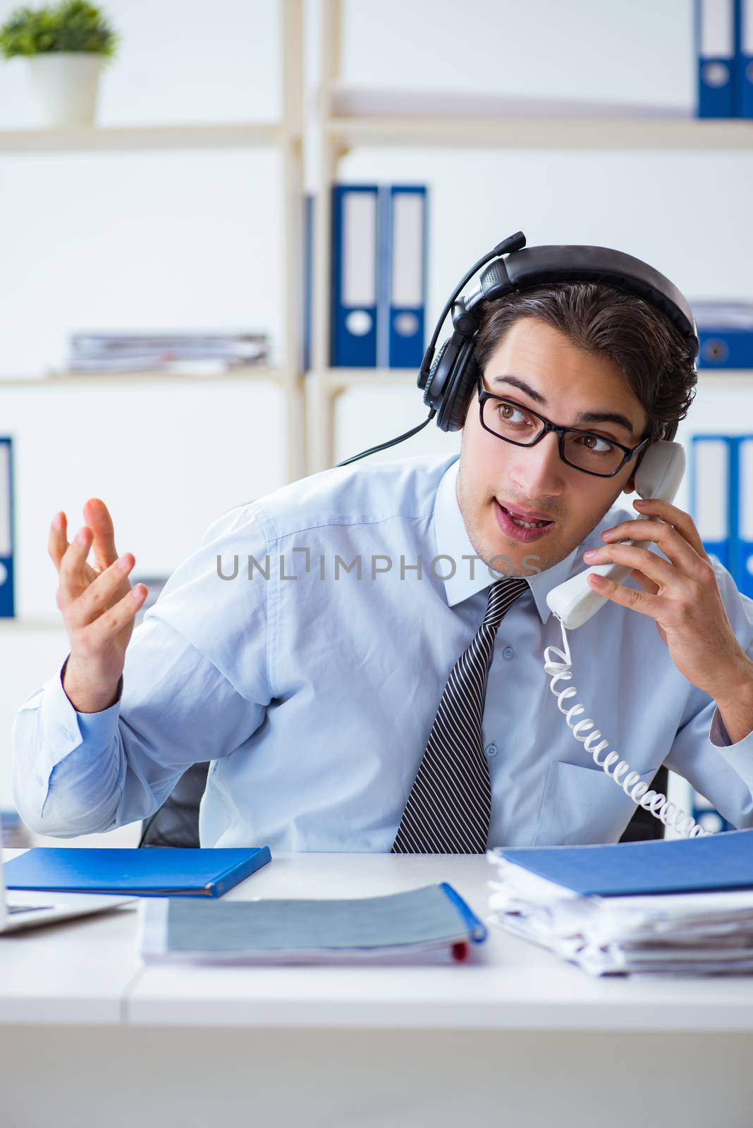 Call center operator talking to customer on live call