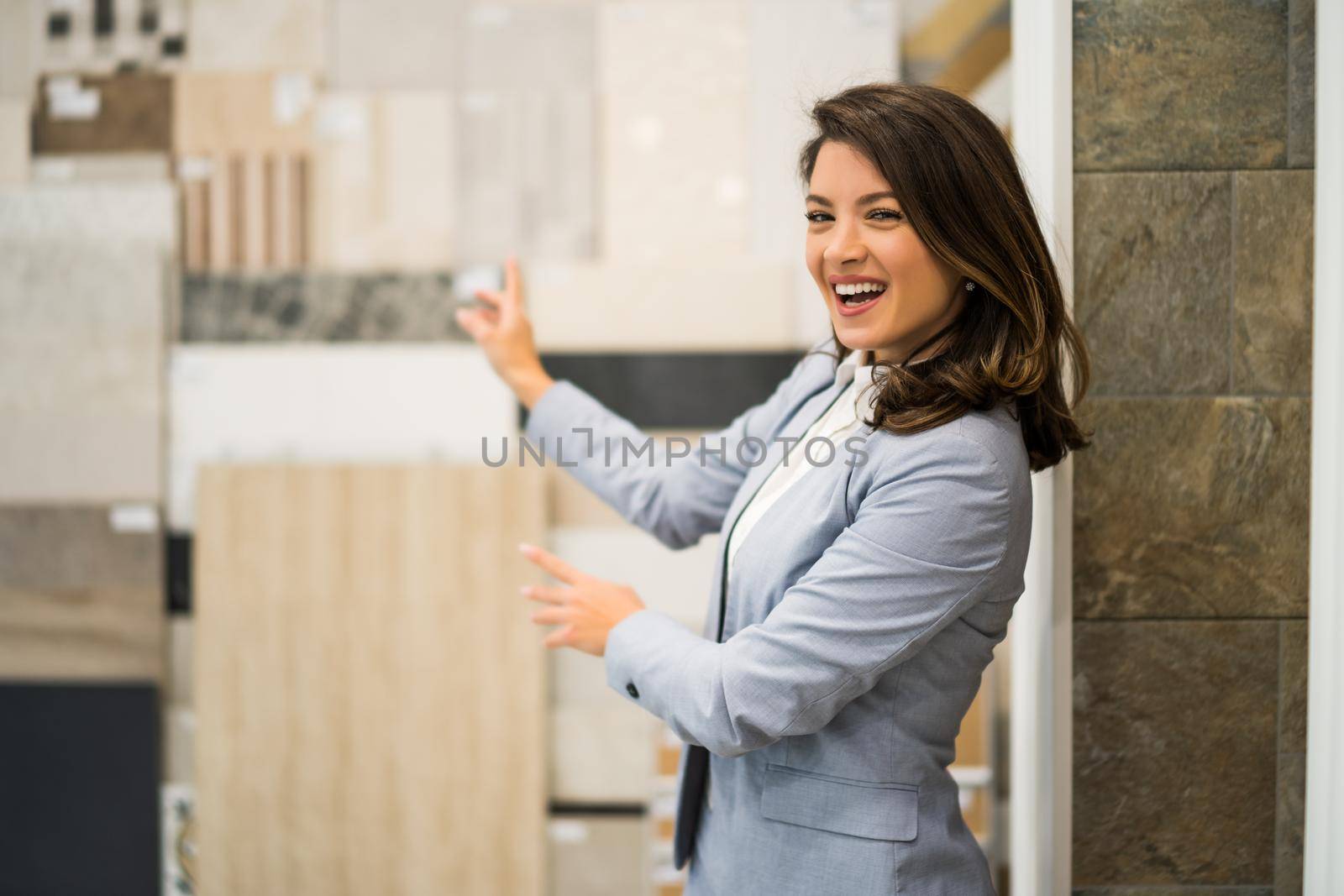 Woman owning small business bath store. Female entrepreneur concept. Happy businesswoman portrait.