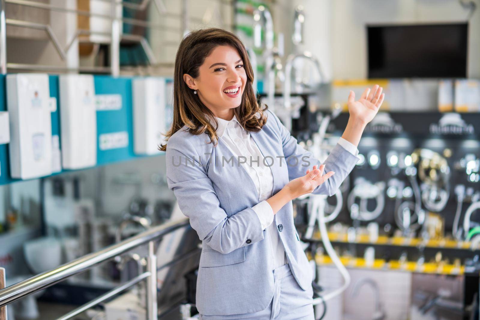 Woman owning small business bath store. Female entrepreneur concept. Happy businesswoman portrait.