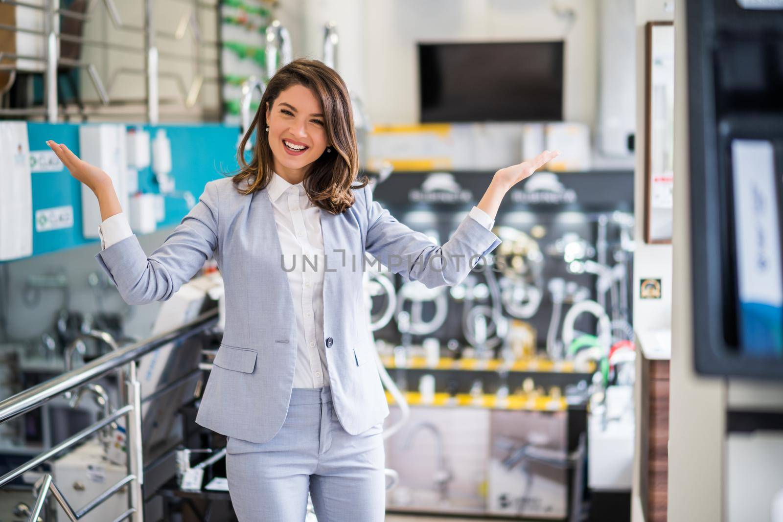 Woman owning small business bath store. Female entrepreneur concept. Happy businesswoman portrait.