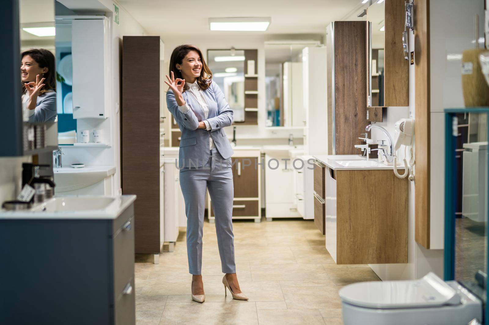 Woman owning small business bath store. Female entrepreneur concept. Happy businesswoman portrait.