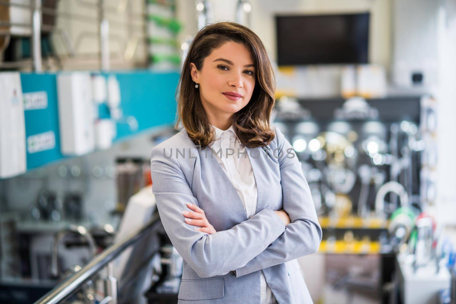 Woman owning small business bath store. Female entrepreneur concept. Happy businesswoman portrait.