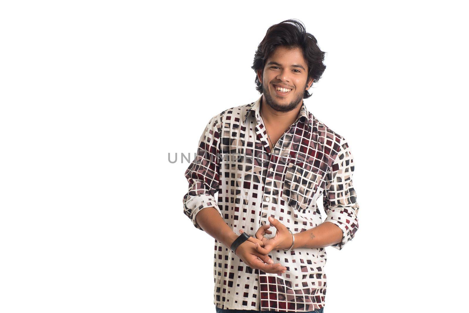 Young man posing on a white background