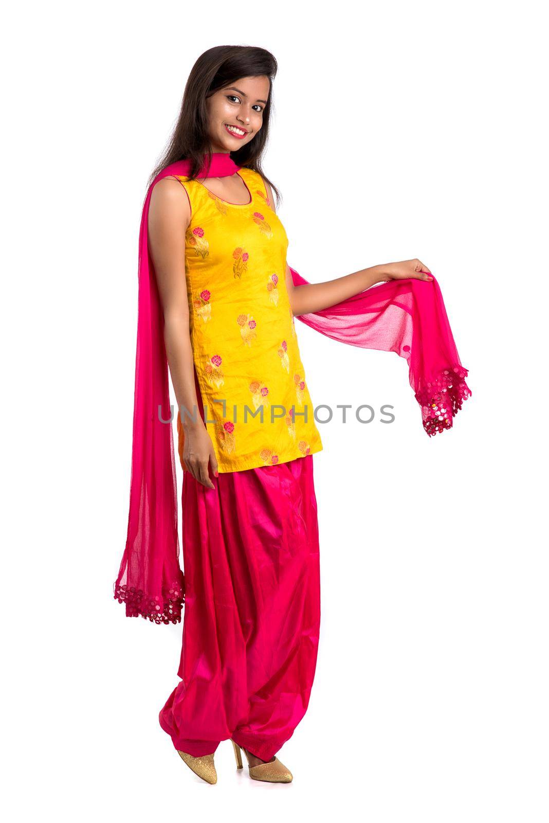 Beautiful Indian traditional girl posing on white background. by DipakShelare